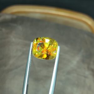 sphene titanite stone loose natural multi colors dispursion weight 6.7 carats size 11.7×10.2×7.38mm